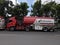 Pertamina oil trucks parked on the side of the road in Malang City for cleaning