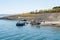 Pertek, Tunceli, Turkey-September 18 2020: Small fishing boats in Keban dam, selective focus