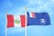 Peru and French Southern and Antarctic Lands two flags on flagpoles and blue sky