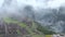 Peru Machu Picchu ancient inca ruin site Panorama with morning clouds.