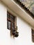 Peru, May, colonial architecture, creative window treatment with recessed frames and hanging pots