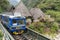 Peru Rail train arriving at Machu Picchu Station