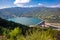 Perucac lake with barrier dam and clean blue water on river Drina in natural park Tara