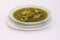 Peruvian Dish: Chicken soup of coriander (aguadito de pollo).