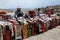 Peruvian selling Colorful Alpaca Cloth near Arequipa, Peru