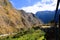 Peruvian train to Machu Picchu passes ancient buildings