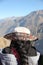 Peruvian woman with hat, vertical