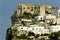 Peschici, Gargano, Apulia, Italy. Peschici promontory with castle and white houses in a sunny day in summer