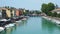 Peschiera del Garda, Italy. Beautiful historical city center. Promenade and entertainment along the water canal. Garda Lake