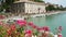 Peschiera del Garda, Italy. The beautiful historical city center. Promenade and entertainment along the water canal. Garda Lake