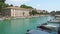 Peschiera del Garda, Italy. The beautiful historical city center. Promenade and entertainment along the water canal. Garda Lake