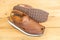 Peshawari sandal use as a formal or casual footwear in summer on wooden background closeup