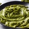 pesto alla genovese served on plate ingredients parmesan basil pine nuts