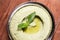 Pesto Hummus served in dish isolated on background top of arabic food cold mezza