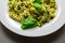 Pesto and pine nut pasta salad, fusilli pasta with regato cheese and baby spinach coated in basil pesto