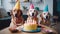 Pet birthday celebration. Golden retrievers celebrating birthday with cake with candles, in living room