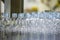 The PET bottles in the rail on the conveyor belt for filling process in the drinking water factory.