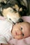 Pet Dog Kissing Newborn Baby Girl