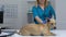 Pet hospital worker stroking dog lying on table, checkup appointment, treatment