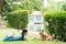 Pet lover An Asian girl is playing with a Shiba Inu dog in the park in the spring