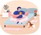 Pet owner young man sitting on bed in bedroom on lotus position holding an apple with cute dog