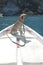 Pet on the prow of a boat