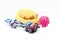 Pet supplies set about plastic bowl, rope, rubber toys with snack bone for dog or cat on white background.