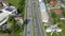 Petaling Jaya, Malaysia - April 8, 2023 Aerial tilt down view on the Jalan Gasing Federal Highway busy road in a sunny day.