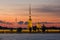 Peter and Paul fortress view from the Palace embankment of the Neva river at sunset during the white nights