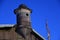 Peter and Pauls fortress tower and flag. Blue sky background.