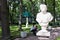 Petergof, Russia, July 2019. Marble statues on the alley of the park at the royal poultry house.