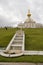 Peterhof, Russia, July 2019. Terraced fountain and the eastern chapel of the palace.