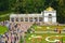PETERHOF, RUSSIA. A view of the Voronikhinsky colonnade and the Big flower bed