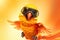 Petfluencers - A Parrot\\\'s Frosty Fantasy: Soaring Through Winter Adventures in Style on Orange Background