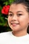 A Petite Philippina Girl Smiling Closeup