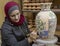 Petra, Jordan - 2019-04-20 - Woman creates intricate mosaic vase