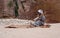 Petra, Jordan. Bedouin man playing traditional instrument