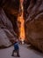 Petra, Jordan - Photographer is taking a picture of the Treasury temple