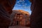 Petra - Treasury Al-Khazneh, stone rock historic sight. Travel Jordan, Arabia holiday. Evening light in nature, red landscape