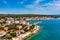 Petrcane village tourist destination coastline aerial panoramic view, Dalmatia region of Croatia. Aerial top view of village