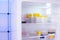 Petri dishes with samples of microorganisms in a laboratory refrigerator