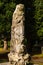 Petrified tree on top of grave.