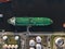 Petrochemical energy heavy transport industry cargo vessel tanker top down aerial drone view. Docked bulk carrier ship