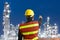 Petrochemical engineering man with white safety helmet standing