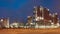 Petrochemical production plant against a cloudy blue sky at twilight, Port of Antwerp, belgium