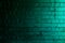 Petrol brick wall background with shades of light and dark teal