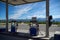 Petrol pumps at the gas station at Eureka Roadhouse  located on the Glenn Highway  with an airplane in the background.