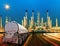 Petroleum container truck and beautiful lighting of oil refinery