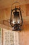 Petroleum lamp in old wooden house