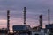 Petroleum oil refinery plant beside river in twilight time